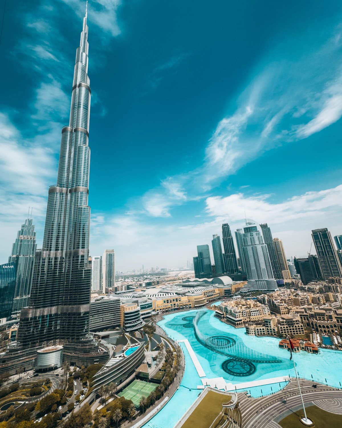 Burj Khalifa rising above Downtown Dubai and its fountain lake